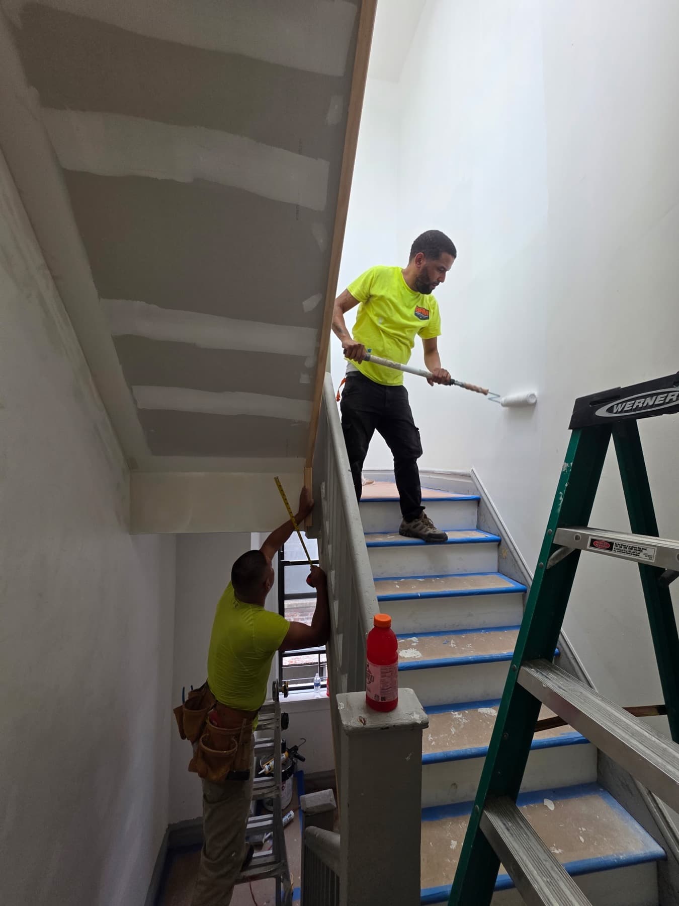 Two BRM crew members finishing a staircase